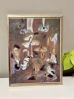 Front view of framed abstract painting showing detailed brushwork and color palette.