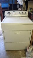 Front view of Kenmore dryer showing control panel and door.
