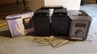 Full view of the Panasonic RQ-V164B cassette player box, JVC speakers, remote, and JVC FS-6000 CD player