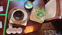 Photo showing assorted bowls and serving plates on a wooden table