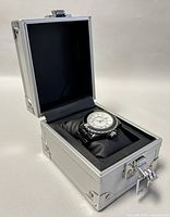 Swiss Legend ladies watch displayed in an open lockable silver aluminum case with black foam interior.