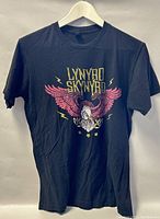 Front view of black Lynyrd Skynyrd T-shirt showing colorful eagle and band name graphic