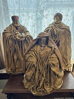 Three Wise Men fabric figurines on surface showing full size and detail