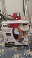 Front view of Shark SC730CN steam cleaner box showing product branding and features.