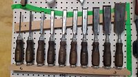 All ten Narex chisels mounted on pegboard holder