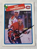 Front view of the Guy Carbonneau O-Pee-Chee hockey card showing the player's image, name, and autograph.