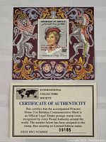 Front view of the Princess Diana commemorative stamp with ornate border and portraits of heraldic lions, includes certificate of authenticity