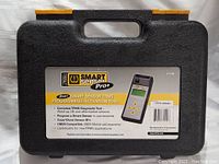 Closed black plastic carrying case with gray label showing the product name, model 17-144 and some specifications.