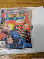 Front cover of DC Comics The Unknown Soldier No 202 showing dramatic WWII illustration with title, DC logo, and price.
