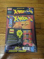 Front view of sealed Marvel Comics 1996 X-Men Special Edition Activity Set showing item and included pop-ups.
