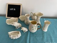 All nine porcelain pieces arranged front-facing