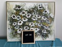 Front view of still life floral painting with white flowers and green foliage in a metallic frame, signed by Yvonne Richardson