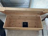 Open top view showing interior of pine blanket box with natural grain and knots