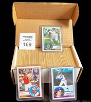 Box of 396 cards with Tony Gwynn card on top in protective sleeve and MaxSold tag.