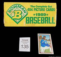 Photo of the original yellow 1989 Bowman Baseball box with green print indicating the complete set of 484 picture cards. Ken Griffey Jr. rookie card placed in front for scale and identification.