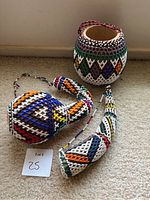 Set of 3 African decorative gourds covered in colorful beadwork showing all items in the lot.
