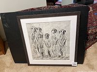 Framed sketch of a group of meerkats standing upright, showing the whole artwork and frame.