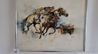 Full view of the framed painting depicting two horses with riders racing.