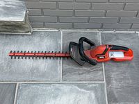 Side view of the Black & Decker hedge trimmer showing the full blade and body