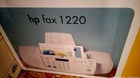 Close-up of HP Fax 1220 box front showing model and product image