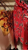 Hanging embroidered yellow tablecloth and red poinsettia print cotton tablecloth