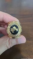 Front view of 1985 Team Canada World Championships replica ring showing maple leaf and text details.