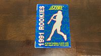 Front view of the 1991 Score Baseball Rookies factory set box showing the main artwork and title.