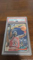 Photo of the front of the 1992 Upper Deck Michael Jordan basketball card graded PSA 6, showing Michael Jordan dunking in his Chicago Bulls uniform.