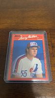 Front of Larry Walker rookie baseball card from 1990 Donruss series in protective sleeve.