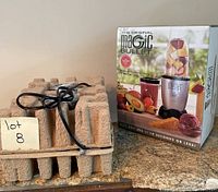 Photo of original boxed Magic Bullet set with molded pulp packaging