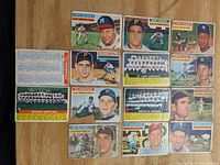 Photo showing 14 Topps baseball cards from 1956 including individual player cards and team cards of Chicago White Sox, Brooklyn Dodgers, and St. Louis Cardinals.
