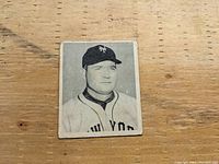 Front of the 1948 Bowman baseball card showing a black and white portrait of Johnny Mize in New York Giants uniform and cap with worn corners.