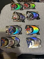 Photo showing 10 hockey trading cards with holographic elements laid out on a flat surface