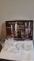 Photo showing 6 Villandry crystal glasses with box, and 2 Denby glass tea mugs on a white cloth