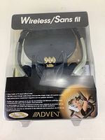 Front view of Advent wireless headphones box highlighting the product inside and 900 MHz wireless capability.