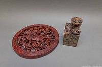 Both Qilin panel and Foo Dog seal block shown side by side on gray background