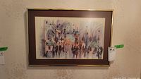 Full view of the framed watercolor wall art showing architectural elements and figures.