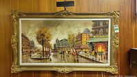 Full frontal view of the framed painting showing overall composition and frame design