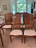 Eight chairs arranged in two rows showing overall lot