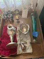 Overview of lot including vase, candlesticks, bowl, cups, trinket box, tongs, salt & pepper shakers