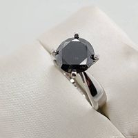 Ring angled view showing band profile and stone
