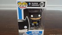 Front view of Batman Funko Pop figure in original box, showing packaging and figure details.