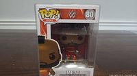 Front view of Mr. T Funko Pop in protective plastic display case inside packaging.