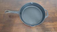 Top view of 12 inch cast iron pan showing its smooth cooking surface and handles