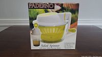 Photo showing Paderno salad spinner box with product image and text