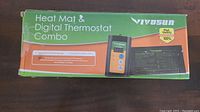 Box front showing 'Heat Mat & Digital Thermostat Combo' by Vivosun, highlighting the product and brand.