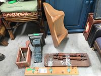 Image showing wood corner shelf, blue painted corbel, wooden box, and boards with coat hooks and decorative pieces