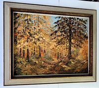 Full view of the framed oil on board painting showing the autumn forest scene with a cream-colored vintage frame.