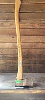 Side view of the 3lb Swedish axe showing wooden handle and signed axe head