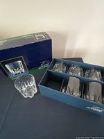 Blue Cristal d’Arques box with one Cheverny whiskey glass displayed outside and remaining glasses inside